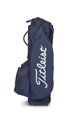 The Titleist Players 5 Stand Bag in navy blue features multiple zippered pockets and displays the white Titleist logo on the side—a premium choice for dedicated golfers.