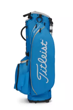 The Titleist Players 5 Stand Bag stands upright in blue, featuring multiple pockets and compartments with the white Titleist logo on the side—an ideal premium golf bag for serious players.