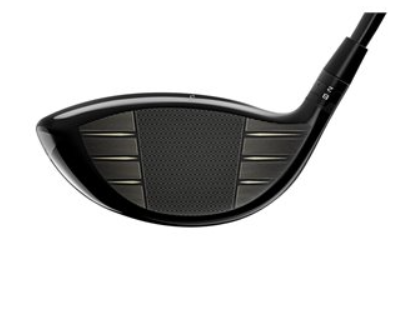 Close-up of the Titleist TSR2 Driver | Prior Generation | Left Handed club head by Titleist, showing its metallic face with horizontal grooves and black finish. The fully visible clubface highlights its detailed texture.