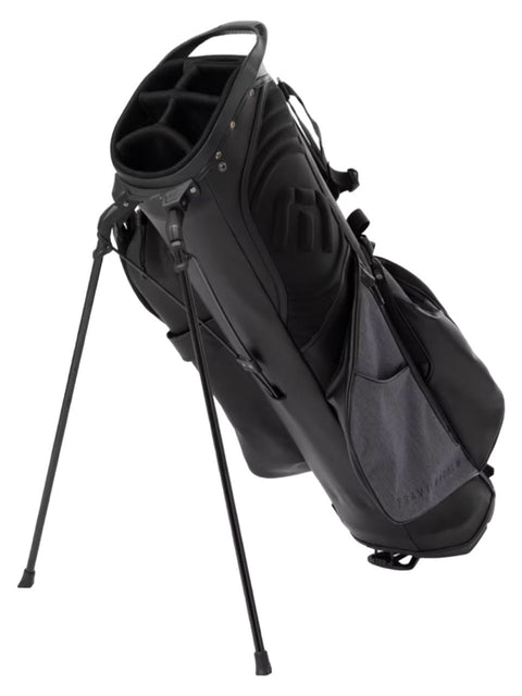 The Travis Mathew Golf BYOB Stand Bag in Heather Dark Grey is a lightweight bag featuring multiple compartments, a top handle, and two extended legs for stability.