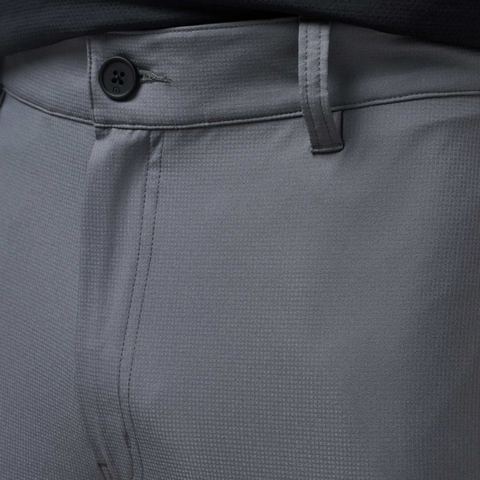 Close-up of Travis Mathew Open To Close Mens Jogger in gray, featuring a button, belt loops, and a subtle textured fabric pattern.