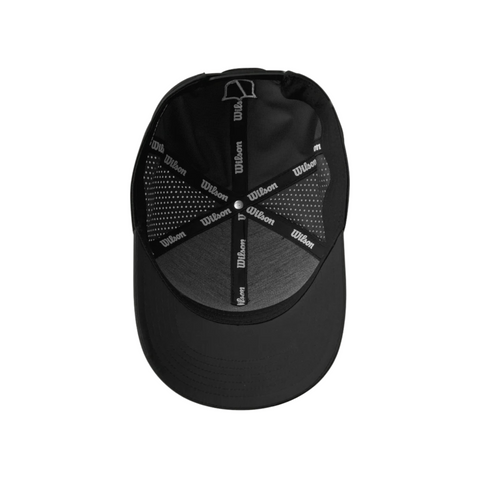 The Wilson 2025 Golf Performance Cap, in black, shown from above reveals its breathable mesh panels and black-and-white Wilson-branded seams inside for a stylish, comfortable golf cap design.