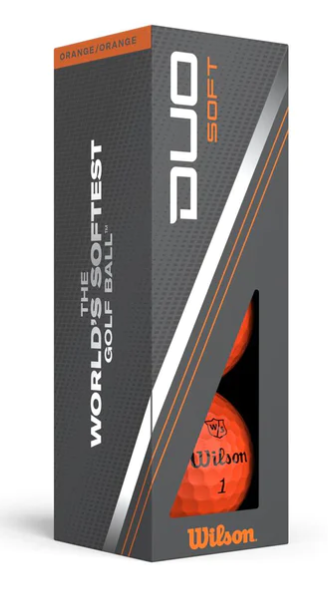 A box of Wilson Duo Soft Golf Balls - Orange - Prior Generation by Wilson shows part of two orange balls through a cutout. The packaging states: “The world’s softest golf ball.”.