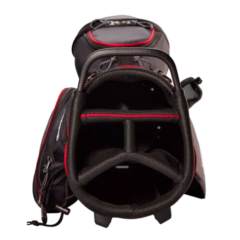A top-down view of the Wilson Lite Carry Bag in Black/Charcoal/Red, a lightweight Wilson golf bag with padded dividers, multiple compartments, a sturdy handle, and comfortable double straps.