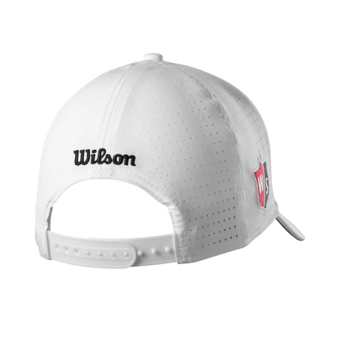 Back view of the Wilson Performance Mesh Cap by Wilson, a breathable golf hat featuring perforated holes, black Wilson embroidery on the back, red and white shield logo on the side, and an adjustable snapback closure.