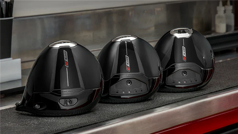 Three Titleist GTS heads sitting on a shelf