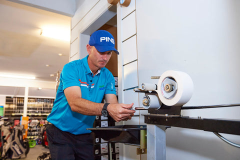 Scott fitting a new golf grip at Golf 360
