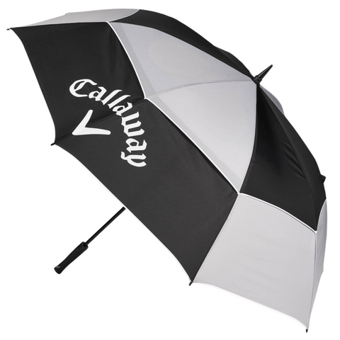 A large black and white Callaway golf umbrella with a black handle, featuring the Callaway logo and text in white on one panel.