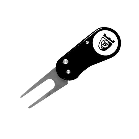 A black golf divot repair tool with a foldable metal prong and a logo featuring a B and a crown on a white circular background.
