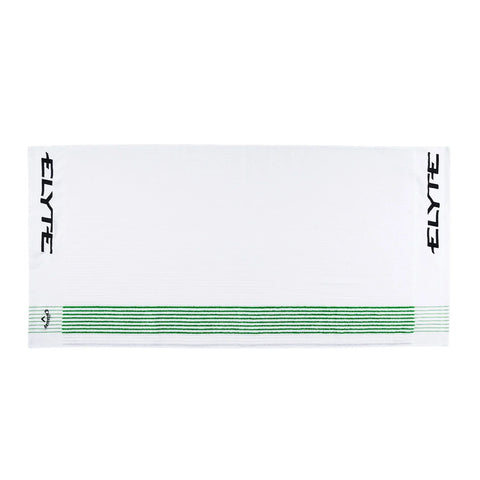 A white towel with ELYTE written in black on both shorter edges and green horizontal stripes near one end. The design is simple and modern.