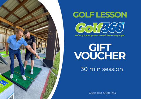 A golf instructor guides a man on his swing at an indoor golf facility. Text reads Golf Lesson Golf 360 Gift Voucher 30 min session.