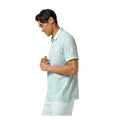 TravisMathew Featherweight Back Nine men's polo Skylight side model view