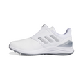 The Adidas 2024 Men’s Solarmotion BOA Spikeless Golf Shoes in White/Silver feature a slip-on design, gray sole, silver accents on the heel and side, three diagonal stripes, low-cut ankle, and a BOOST midsole for comfort.