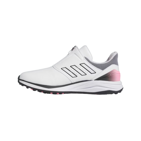 The Adidas 2024 Women's Solarmotion BOA Golf Shoes in White/Black/Pink feature three black stripes, a mesh heel, textured rubber sole, and the BOA Fit System for a secure fit.