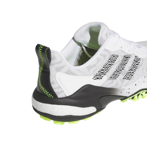 A close-up of the heel and side of the Adidas 2025 Men's Codechaos Golf Shoes highlights black and neon green accents, textured mesh, and a patterned spikeless sole for grip and comfort on the course.