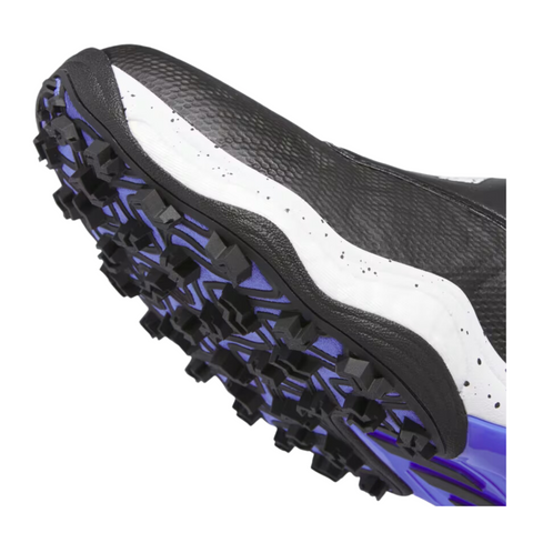 Close-up of the sole of the Adidas 2025 Women's Codechaos Boa Spikeless Golf Shoes in black, white, and cobalt blue, showing multidirectional rubber studs for traction—part of Adidas’ innovative collection.