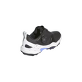The Adidas Codechaos Boa 25 Spikeless Womens Golf Shoes, in black with a white heel, blue accents, speckled midsole, and Boa Fit System dial closure, are shown from a rear side angle against a white background.
