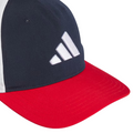 A close-up of the Adidas Colourblock Snapback Hat shows its navy blue crown, white side panels, bright red bill, front white Adidas logo, and adjustable snapback for a custom fit.