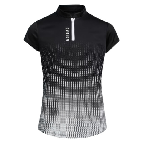 The Adidas G Zip Mock Neck Junior Girls Golf Shirt in black features a high collar, half zipper, and dotted gradient pattern with ADIDAS text near the zipper