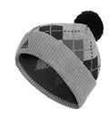 The Adidas Women's Graphic PomPom Beanie in Grey/Black features a stylish argyle pattern, a graphic pompom, and the Adidas logo on the ribbed brim, all showcased on a clean white background.