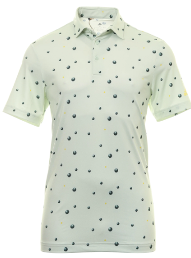 The Adidas Junior Golf Printed Polo in Linen Green features a collar, buttons, and a playful pattern