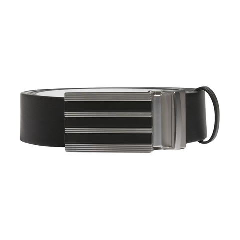The Adidas Men’s 3-Stripes Tour Belt in black features genuine leather and a sleek, rectangular metallic buckle with three horizontal grooves, displayed coiled on a white background.
