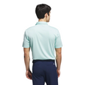 A man with short dark hair, wearing the Adidas Mens Performance Chest Stripe Print Polo Shirt in Flash Aqua and navy pants, stands with his back to the camera against a white background.