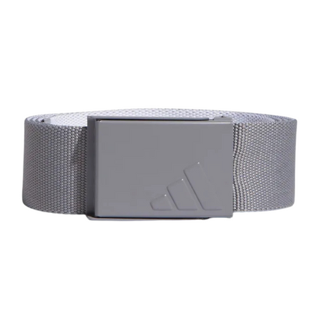 The Adidas Men’s Reversible Webbing Belt in Grey/White features a minimalist design with a rectangular gray buckle and subtle embossed logo. Its textured, reversible webbing makes it an ideal mens golf belt.