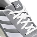 Close-up of Adidas Mens S2G 24 Spikeless Golf Shoes in gray, featuring white laces, three white stripes on the side, a white Adidas logo on the tongue, textured surface, and detailed stitching for style and performance.
