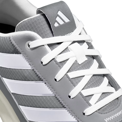 Close-up of Adidas Mens S2G 24 Spikeless Golf Shoes in gray, featuring white laces, three white stripes on the side, a white Adidas logo on the tongue, textured surface, and detailed stitching for style and performance.