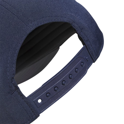 Close-up of the Adidas Mens Tour Five-Panel Hat in navy, highlighting its breathable design and adjustable snapback strap with multiple plastic holes.