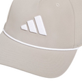 The Adidas Mens Tour Five-Panel Hat in putty beige features breathable performance fabric, a white Adidas logo, and white rope detail above the brim for a classic look.