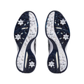 The image shows the bottom of Adidas Mens ZG23 Vent Golf Shoes (US 8.5, 9), with black, white, and navy blue textured soles featuring removable spikes and Boost technology for comfort—perfect for golf enthusiasts.