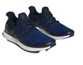 A pair of Adidas Men's Ultraboost Golf Shoes in navy and red are displayed side by side on a white background, featuring white soles, BOOST™ cushioning, and blue patterned knit uppers.
