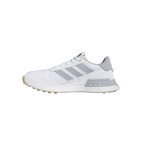 The Adidas S2G SL 24 Wide Golf Shoes are white sneakers with light gray accents, three gray side stripes, a gray heel detail, white laces, and a beige sole—perfect for golfers seeking style and comfort in spikeless shoes.