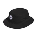The Adidas Solid Bucket Hat | Black features a wide brim and a circular white Adidas logo patch on the front, offering stylish sun protection for both golf and everyday wear.