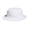 The Adidas Solid Bucket Hat in Collegiate Navy features a wide brim and flat top for great sun protection. Made by Adidas, this hat ensures comfort with moisture-wicking fabric and is shown against a white background.