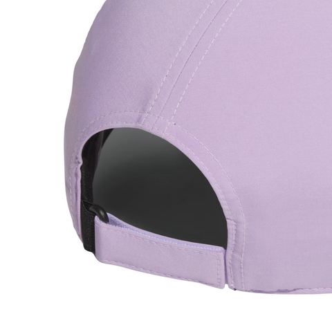 Close-up of the Adidas Womens Tour Badge Cap, a light purple golf cap for women with an adjustable strap, detailed stitching, and moisture-wicking fabric.