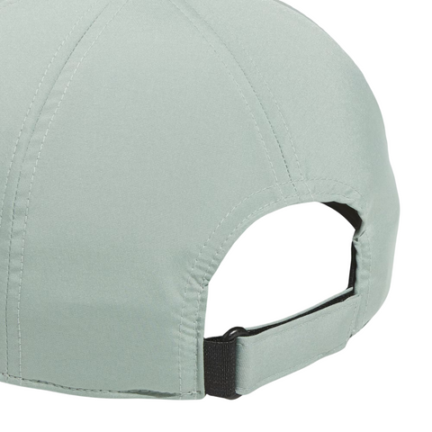 Close-up view of the Adidas Womens Tour Badge Cap in light gray, showing detailed stitching, an adjustable strap with a black clasp, and moisture-wicking fabric that offers sun protection.