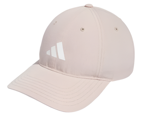 The Adidas Womens Tour Badge Hat in Wonder Taupe features a curved brim, white front-left logo, stitched details, metal eyelets for ventilation, and moisture-wicking fabric to keep you cool.