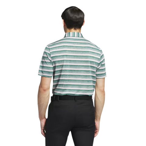 A man, seen from behind, wears an Adidas Two-Colour Striped Men's Polo Shirt—green and white stripes—paired with black pants and a black belt, set against a white background.