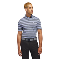 A man with short, light brown hair wears an Adidas Two-Colour Striped Men's Polo Shirt, black pants, and a belt, standing and looking left against a plain white background.