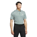 A man in an Adidas Two-Colour Striped Men's Polo Shirt, featuring moisture-wicking fabric, black pants, and a black belt stands against a white background.