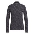 The Adidas Ultimate365 Printed Quarter-Zip Long-Sleeve Polo Shirt in Black/Powder Plum features a sporty quarter-zip front and a stylish geometric line pattern.