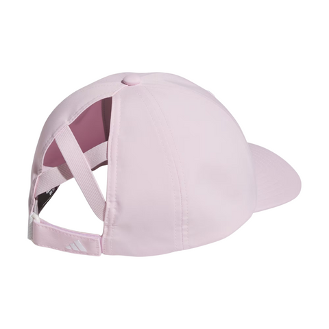 The Adidas Womens Crisscross Hat in Clear Pink by golf360nz features a curved brim, moisture-wicking fabric, adjustable strap, and Adidas logo on the back, displayed from a rear side angle against a white background.