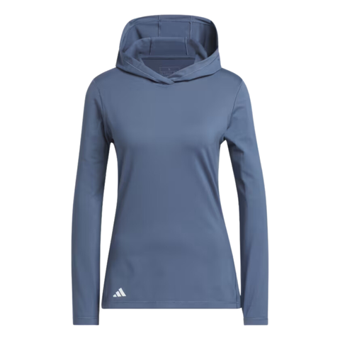 The Adidas Women's Performance Golf Hoodie in blue, made from soft stretch fabric with long sleeves and a hood, features a subtle white Adidas logo near the left hem and is shown on a plain white background.