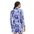 Seen from the back, a person with braided hair wears an Adidas Women's Ultimate365 Long Sleeve Shirt and blue and purple abstract shorts with UV 50+ fabric for sun protection.