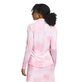 A woman with curly hair stands with her back to the camera in an Adidas Women's Ultimate365 Long Sleeve Shirt against a white background. The shirt provides UV 50+ sun protection.