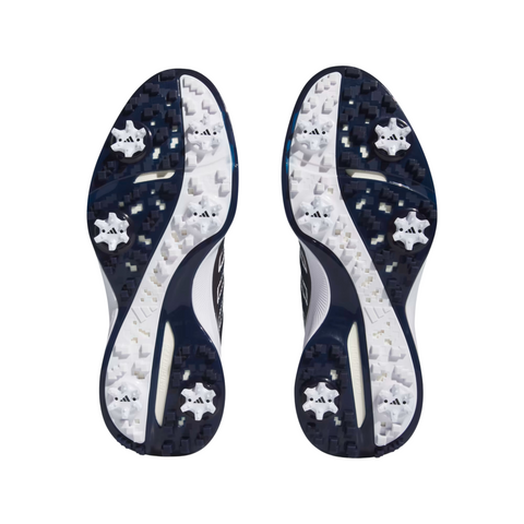 Bottom view of Adidas Men's ZG23 Vent Golf Shoes (US 9 Only) showing Boost soles, removable spikes, and black, white, and navy blue traction patterns on a white background.
