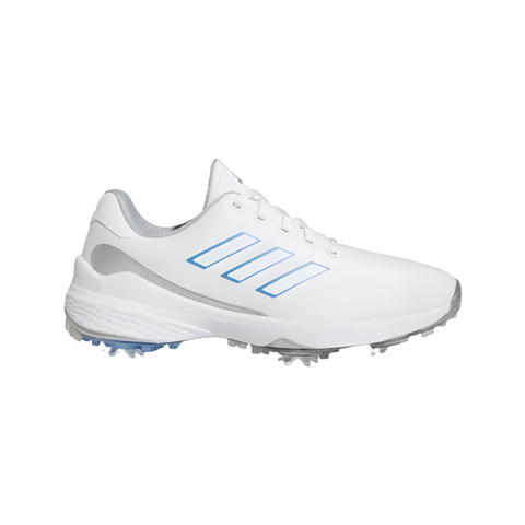 The Adidas Womens ZG23 Golf Shoes in White/Blue/Silver (US 7 only) feature light blue stripes, silver accents, and a spiked sole for ultralight performance, shown in a side view against a white background.